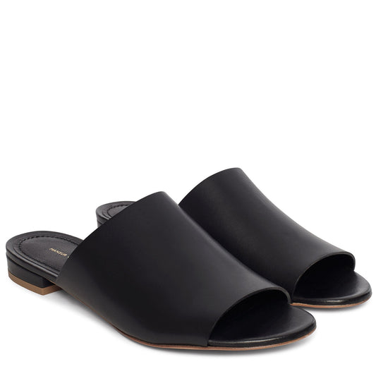 Vegetable Tanned Flat Mule - Black - Mansur Gavriel. Designed in NYC, made in Italy.