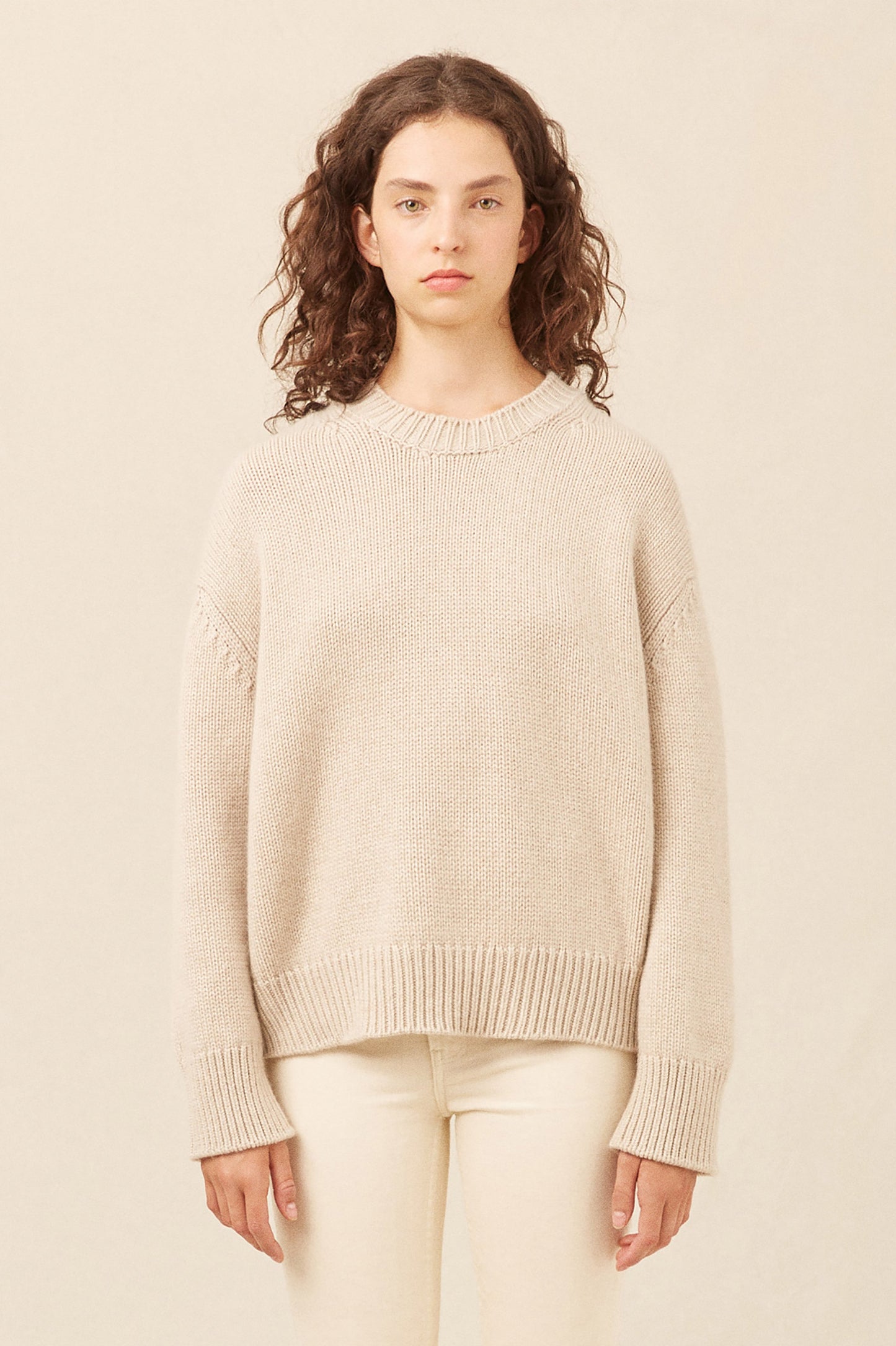 Italian cashmere beige crewneck sweater.