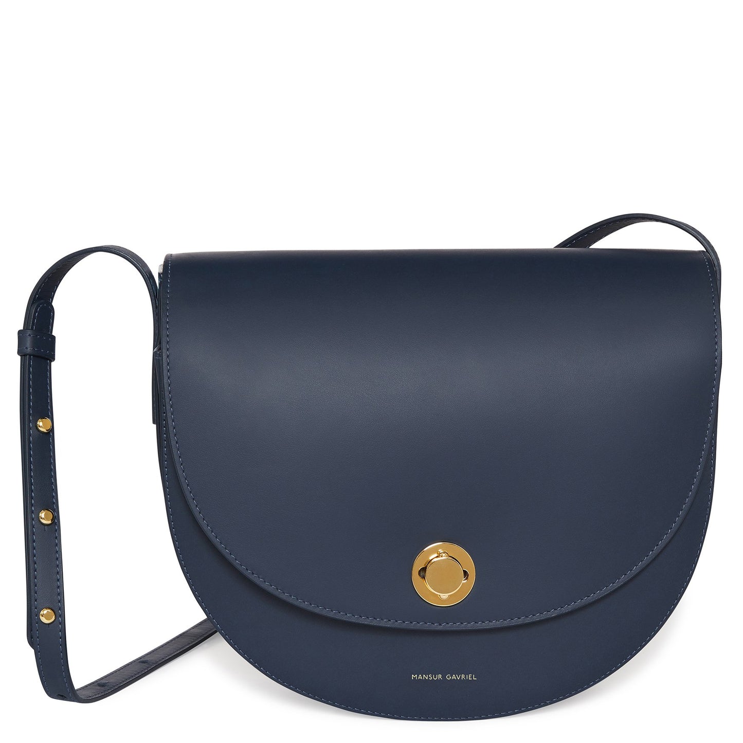 Italian calf leather navy saddle bag with two interior pockets and beige canvas interior.