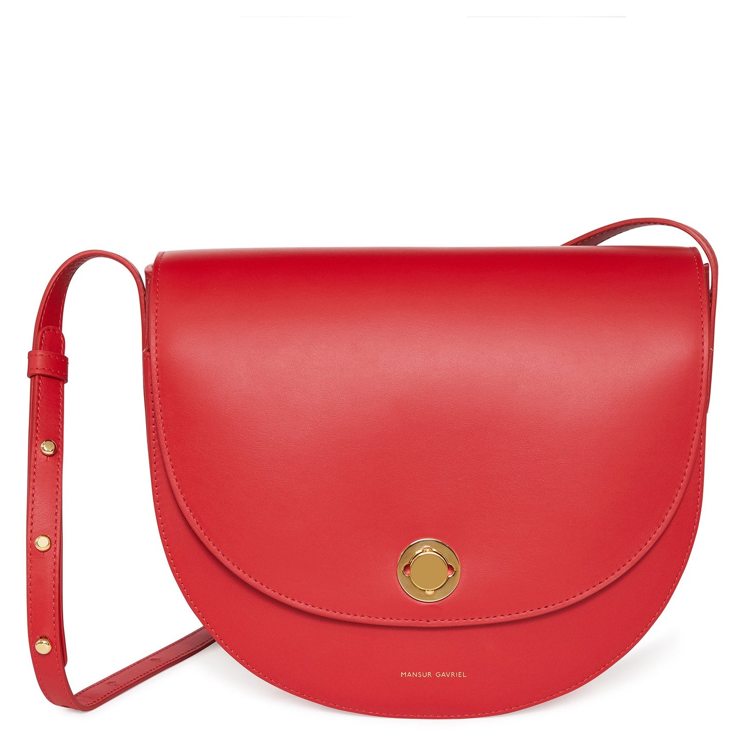 Italian calf leather red saddle bag with two interior pockets and beige canvas interior.