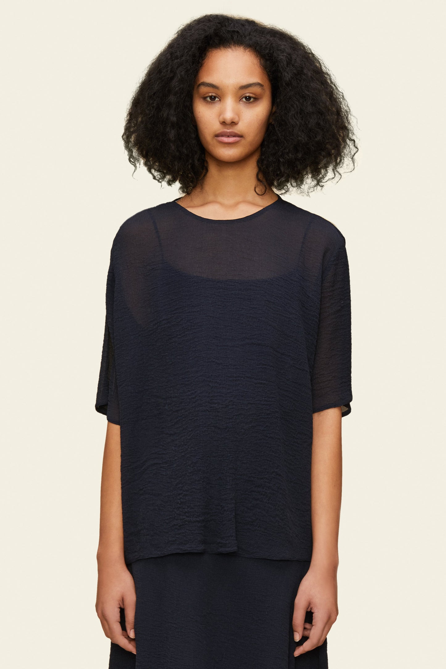 Italian silk navy short sleeve blouse.