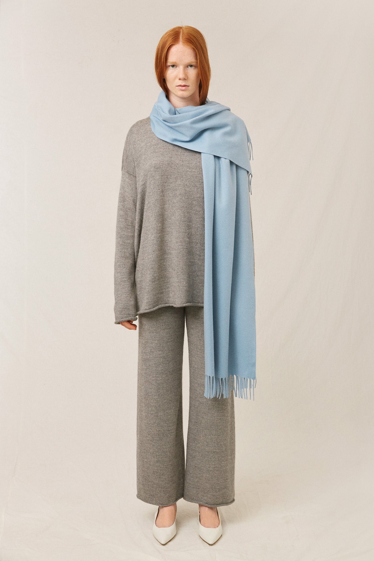 Italian cashmere light blue winter scarf.