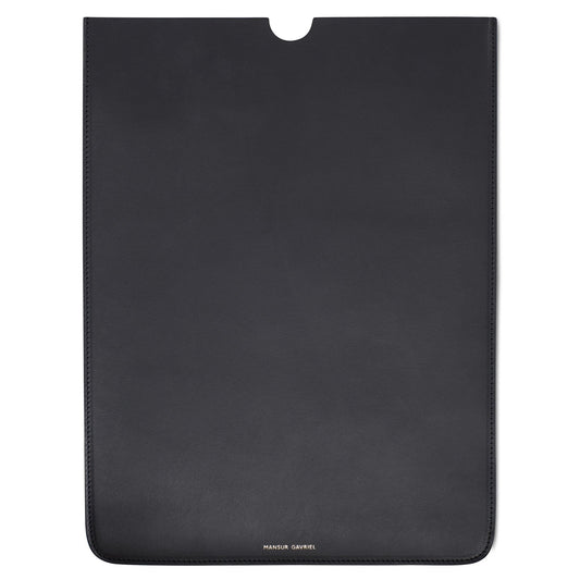 Italian vegetable tanned leather black 11" laptop sleeve with navy matte patent interior.