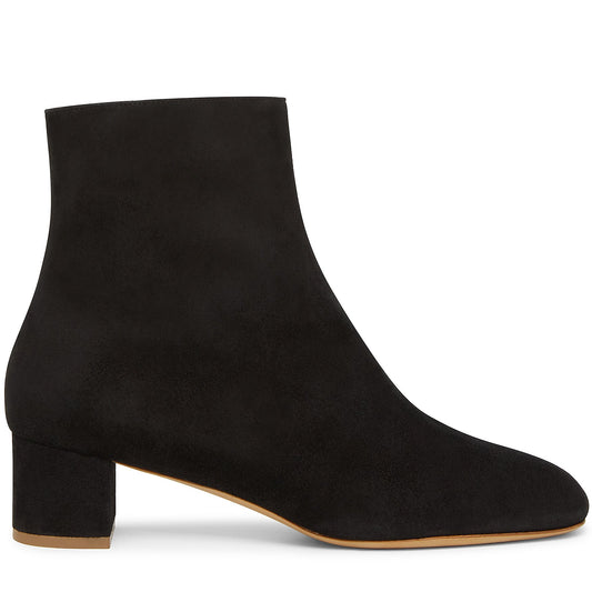 Italian shearling black mid ankle boot with tonal side zipper, shearling lining and insole.