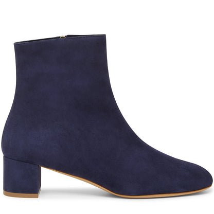 Italian shearling blu mid ankle boot with tonal side zipper, shearling lining and insole.