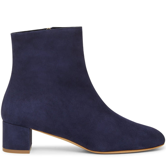 Italian shearling blu mid ankle boot with tonal side zipper, shearling lining and insole.