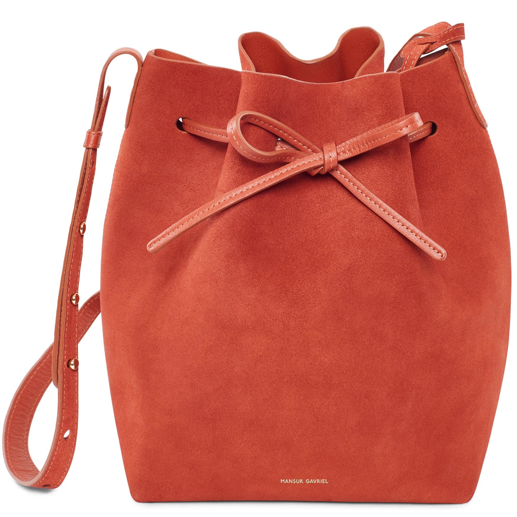 Italian suede leather rust bucket bag with raw interior.