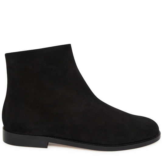 Italian shearling black mid ankle boot with tonal side zipper, calf leather lining and insole.