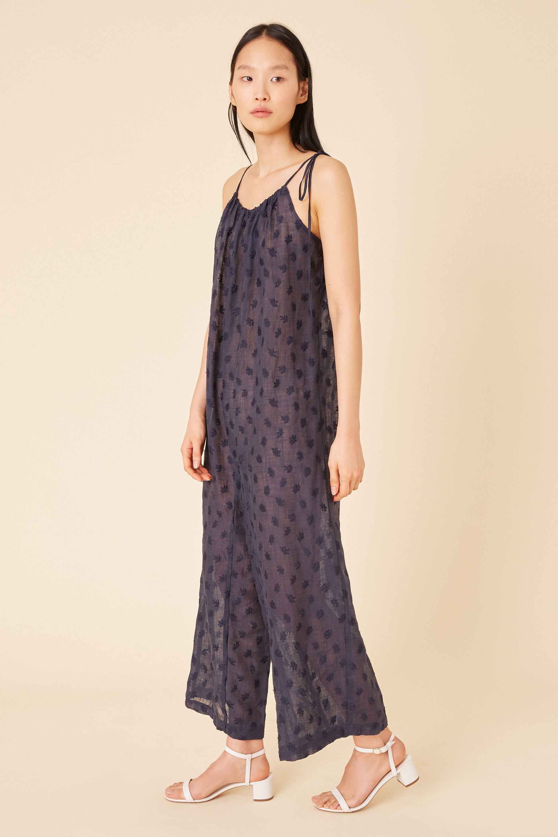 Italian floral embroidered navy linen jumpsuit.