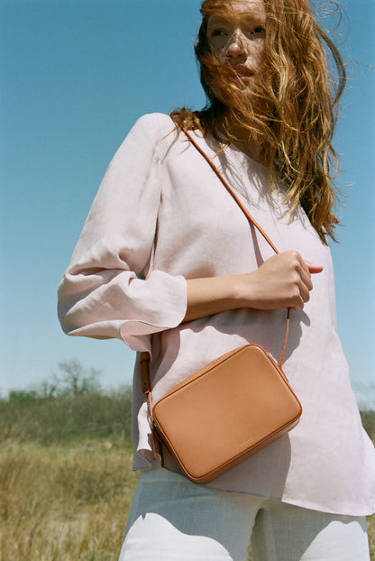 Italian linen blush flared sleeve top.