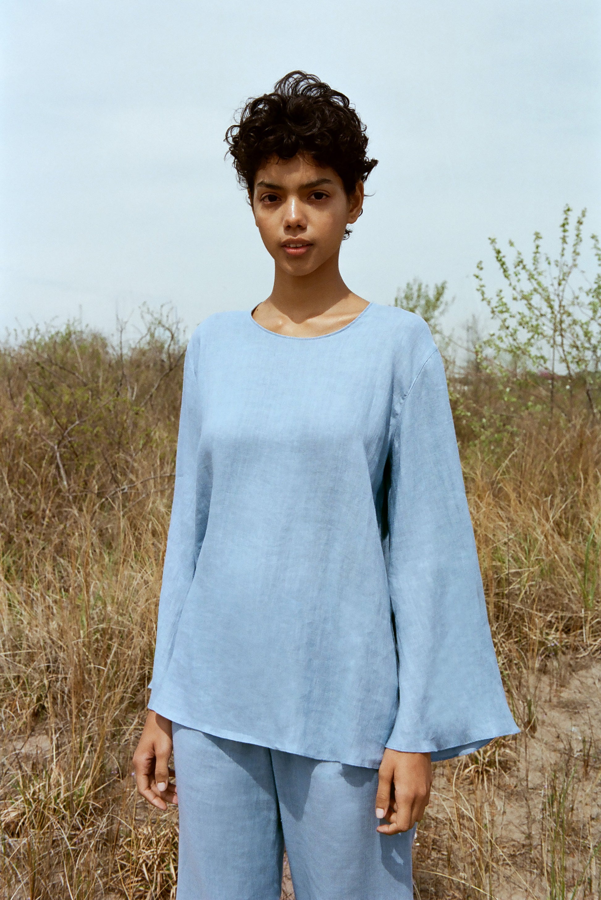 Italian linen sky blue flared sleeve top.
