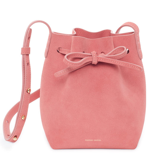 Italian suede leather blush mini mini bucket bag with raw interior.