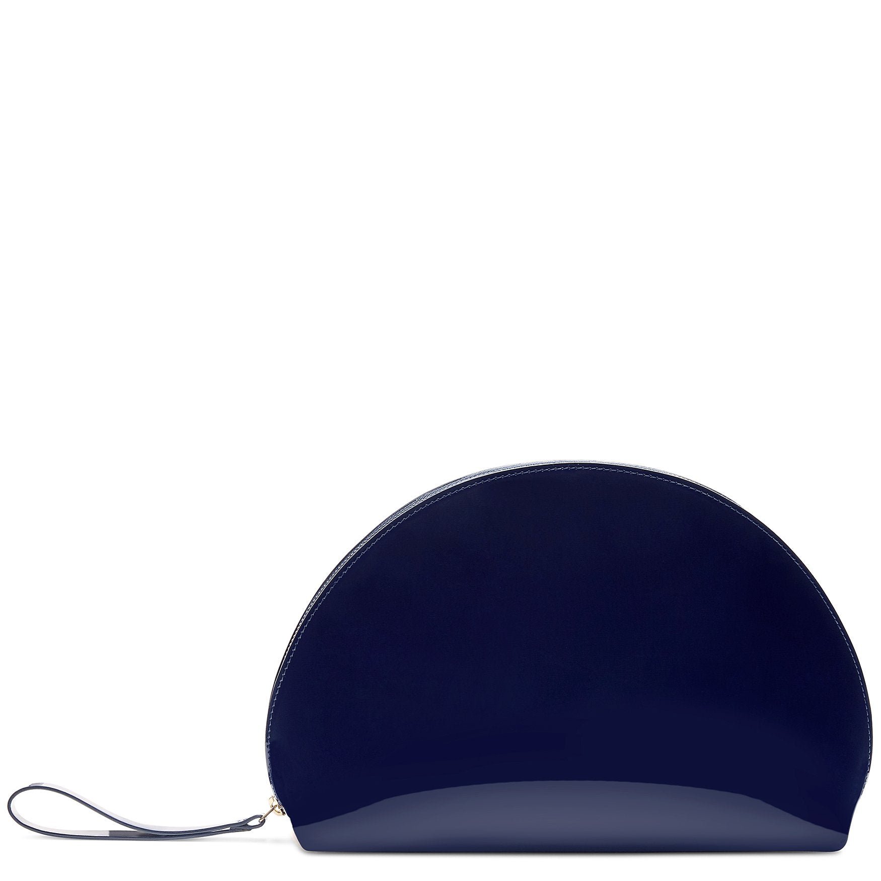 Italian patent leather navy moon clutch with navy suede leather interior.