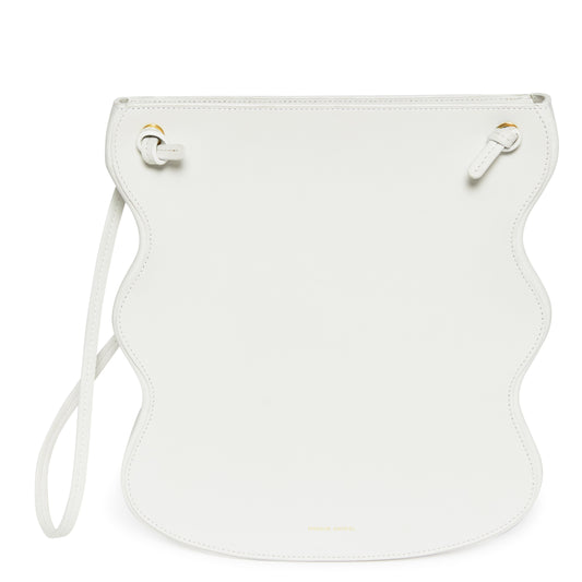 Italian calf leather white ocean bag with beige canvas interior and scalloped edge.